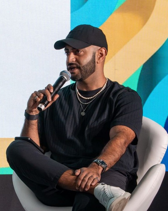 Salty, founder of GRVTY, speaking on stage
